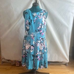 Sleeveless Scuba Cocktail Dress With Big Floral Print and Pockets